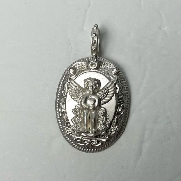 Rebecca Collins Silver Tone Oval Cherub Angel Pendant - Picture 1 of 4